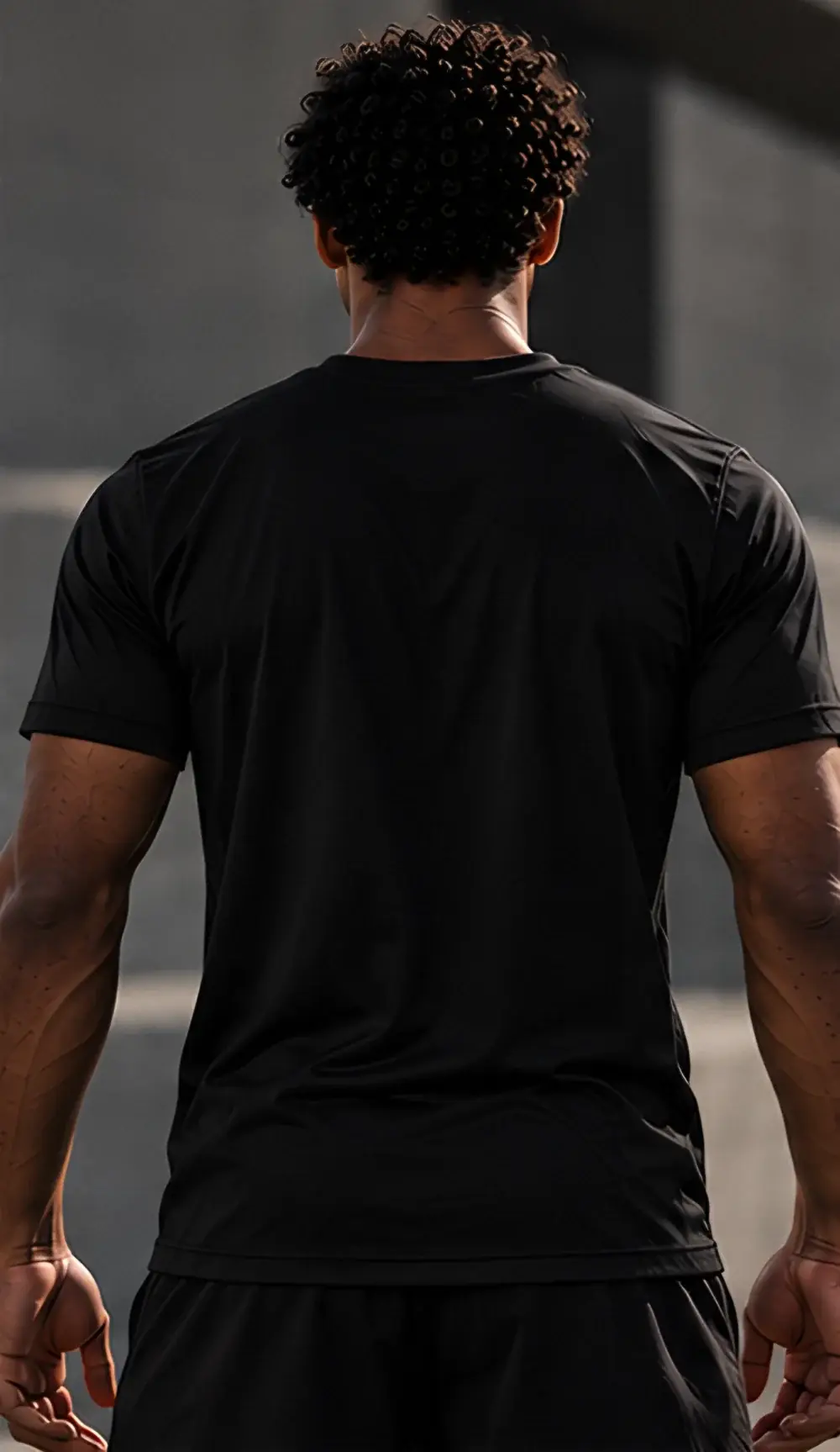 Training tee on a model, from behind